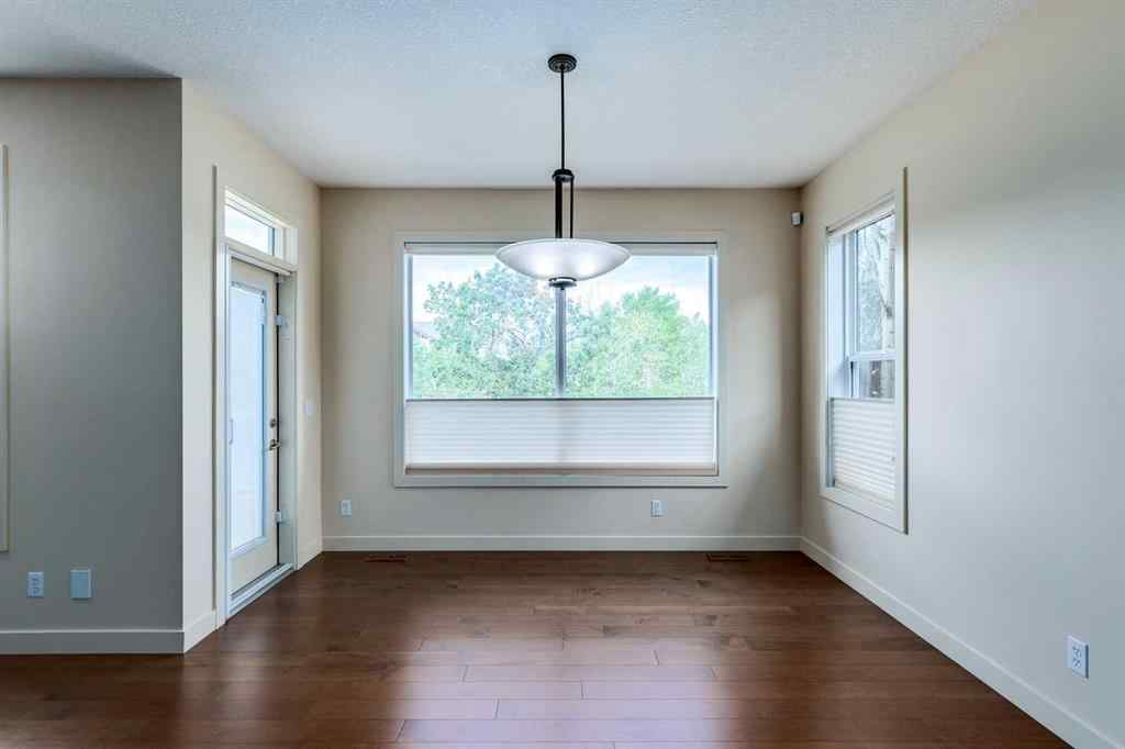 MLS® A2243122 - 94 Tuscany Summit Green NW in Tuscany Calgary, Residential