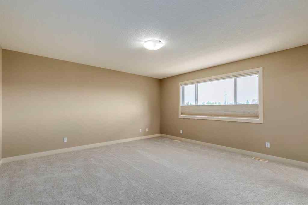 MLS® A2243122 - 94 Tuscany Summit Green NW in Tuscany Calgary, Residential