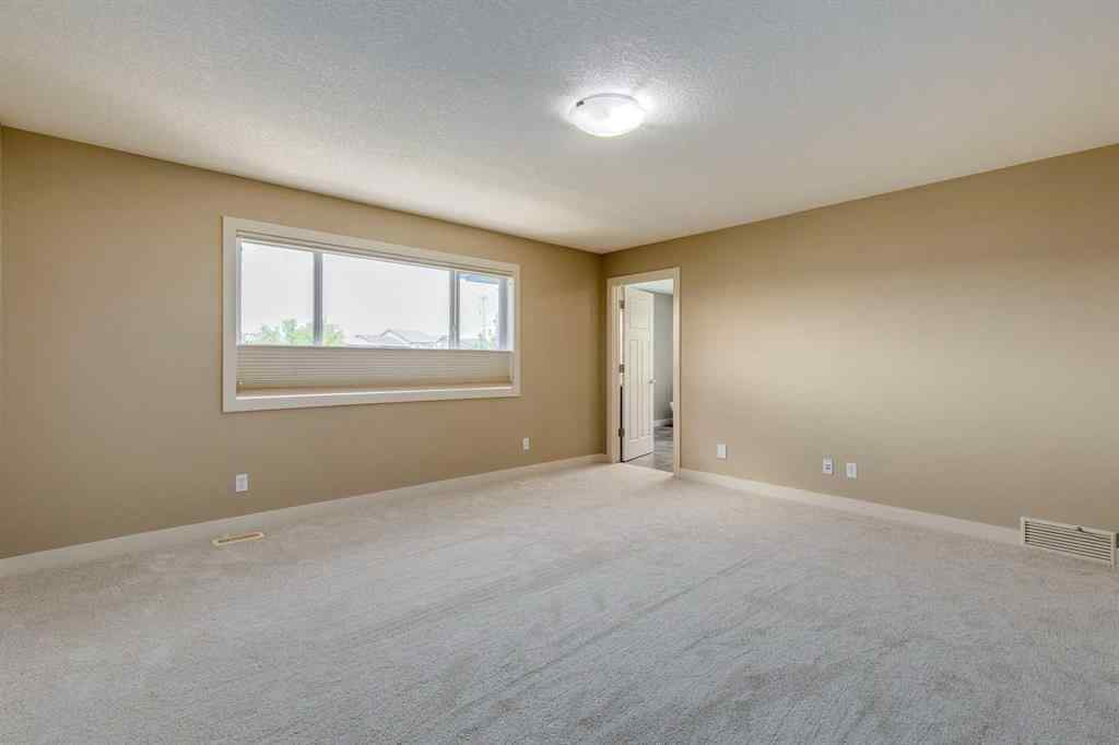 MLS® A2243122 - 94 Tuscany Summit Green NW in Tuscany Calgary, Residential