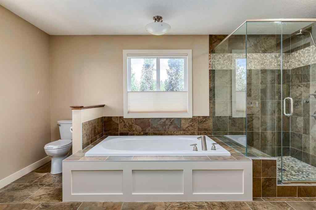 MLS® A2243122 - 94 Tuscany Summit Green NW in Tuscany Calgary, Residential