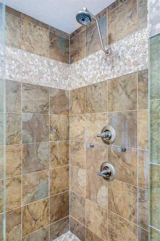 MLS® A2243122 - 94 Tuscany Summit Green NW in Tuscany Calgary, Residential