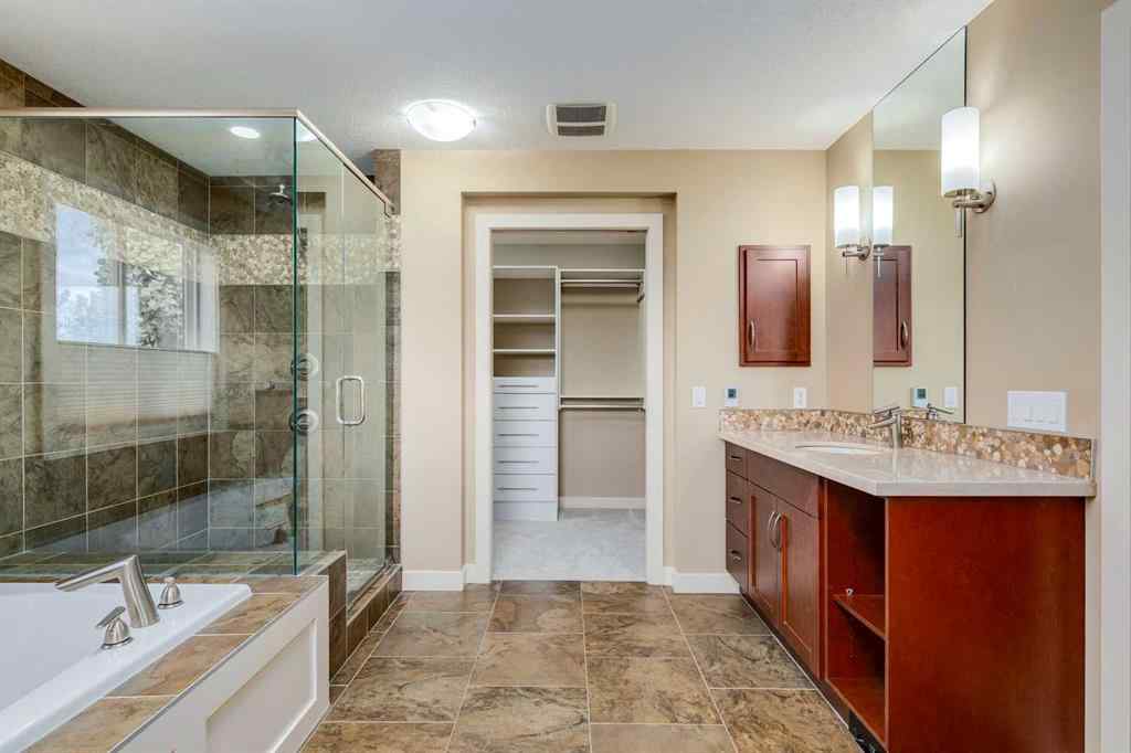 MLS® A2243122 - 94 Tuscany Summit Green NW in Tuscany Calgary, Residential