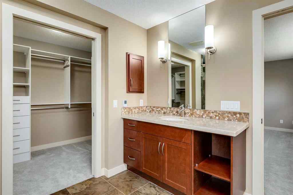 MLS® A2243122 - 94 Tuscany Summit Green NW in Tuscany Calgary, Residential