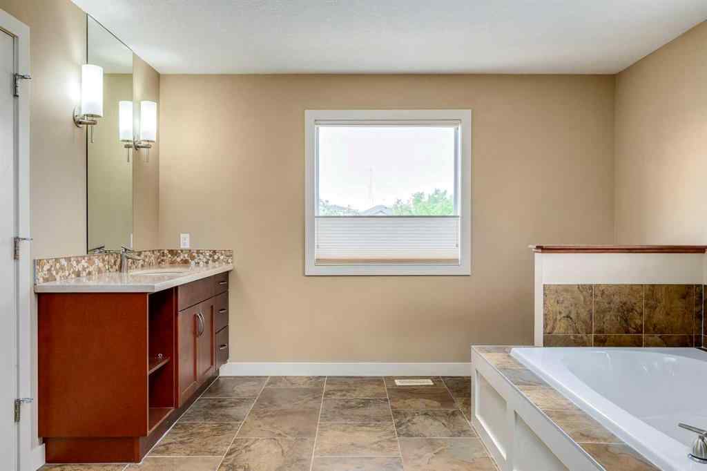MLS® A2243122 - 94 Tuscany Summit Green NW in Tuscany Calgary, Residential