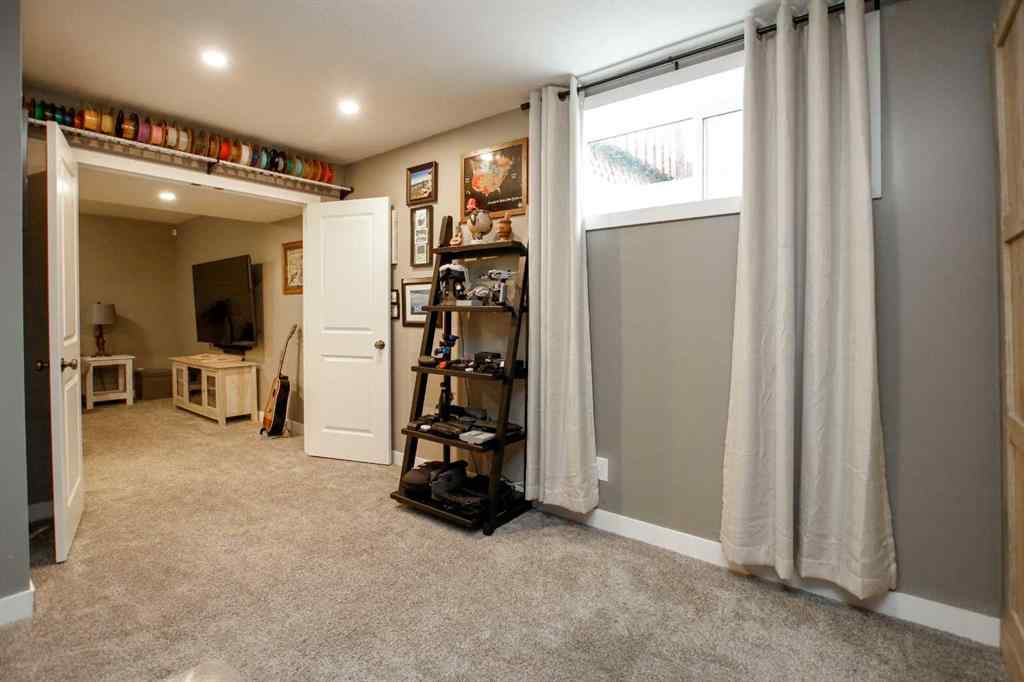MLS® A2243126 - 2 Cross Street  in Trinity Crossing Lacombe, Residential