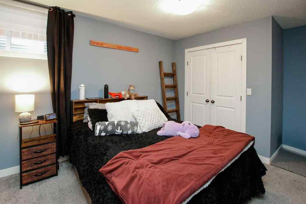 MLS® A2243126 - 2 Cross Street  in Trinity Crossing Lacombe, Residential