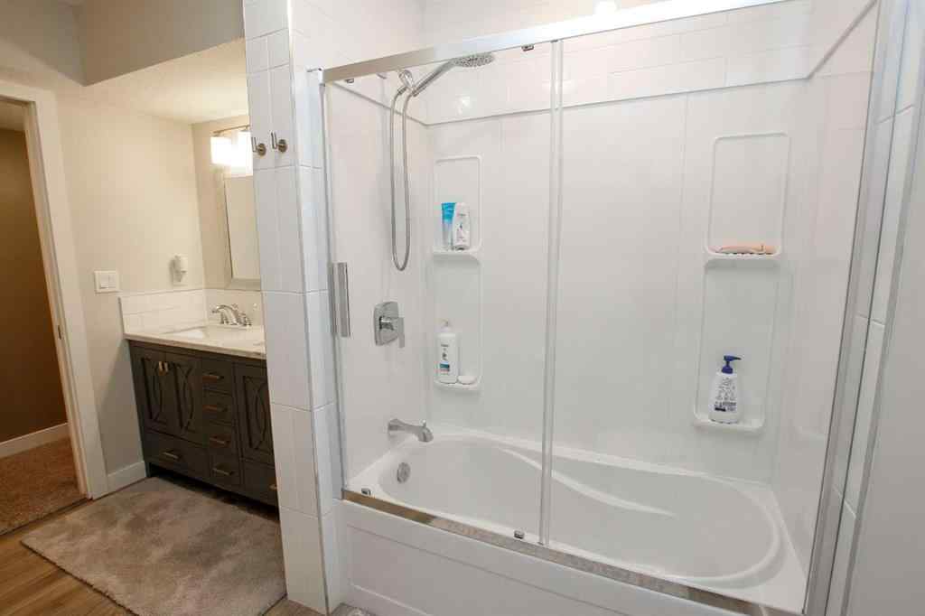 MLS® A2243126 - 2 Cross Street  in Trinity Crossing Lacombe, Residential