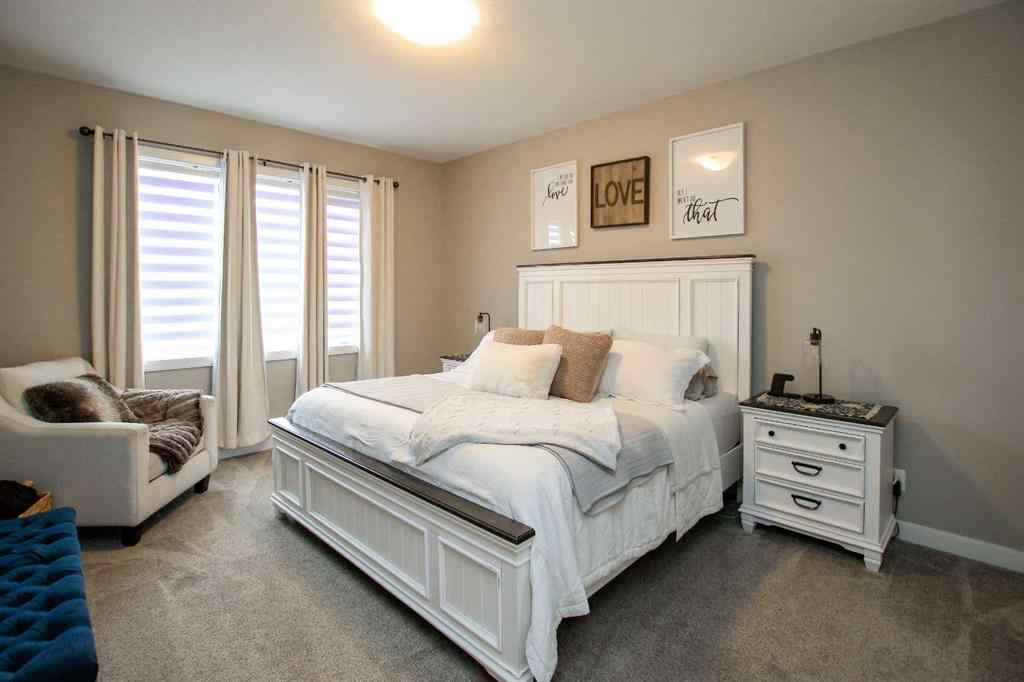 MLS® A2243126 - 2 Cross Street  in Trinity Crossing Lacombe, Residential