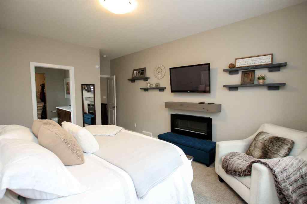 MLS® A2243126 - 2 Cross Street  in Trinity Crossing Lacombe, Residential