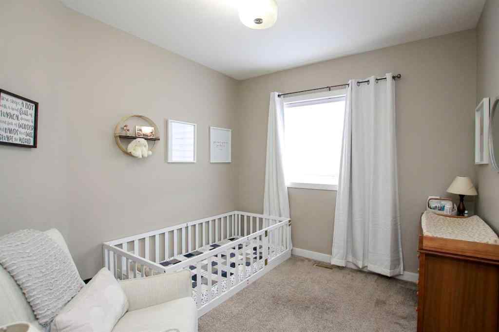 MLS® A2243126 - 2 Cross Street  in Trinity Crossing Lacombe, Residential