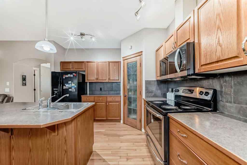 MLS® A2243143 - Unit #116 100 Coopers Common SW in Coopers Crossing Airdrie, Residential