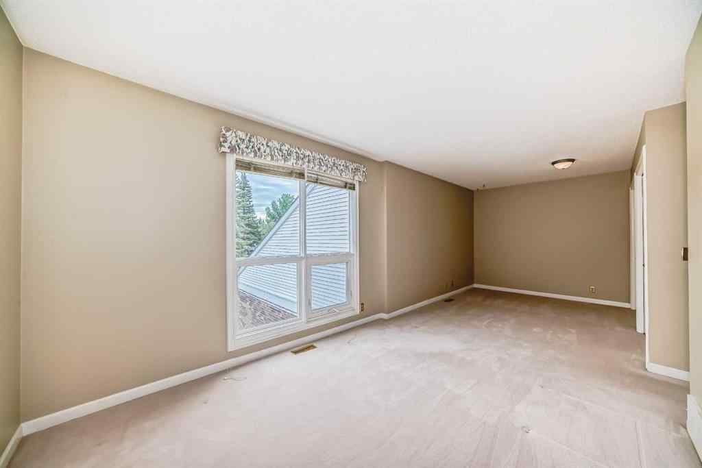 MLS® A2243212 - Unit #23 275 Woodridge Drive SW in Woodlands Calgary, Residential