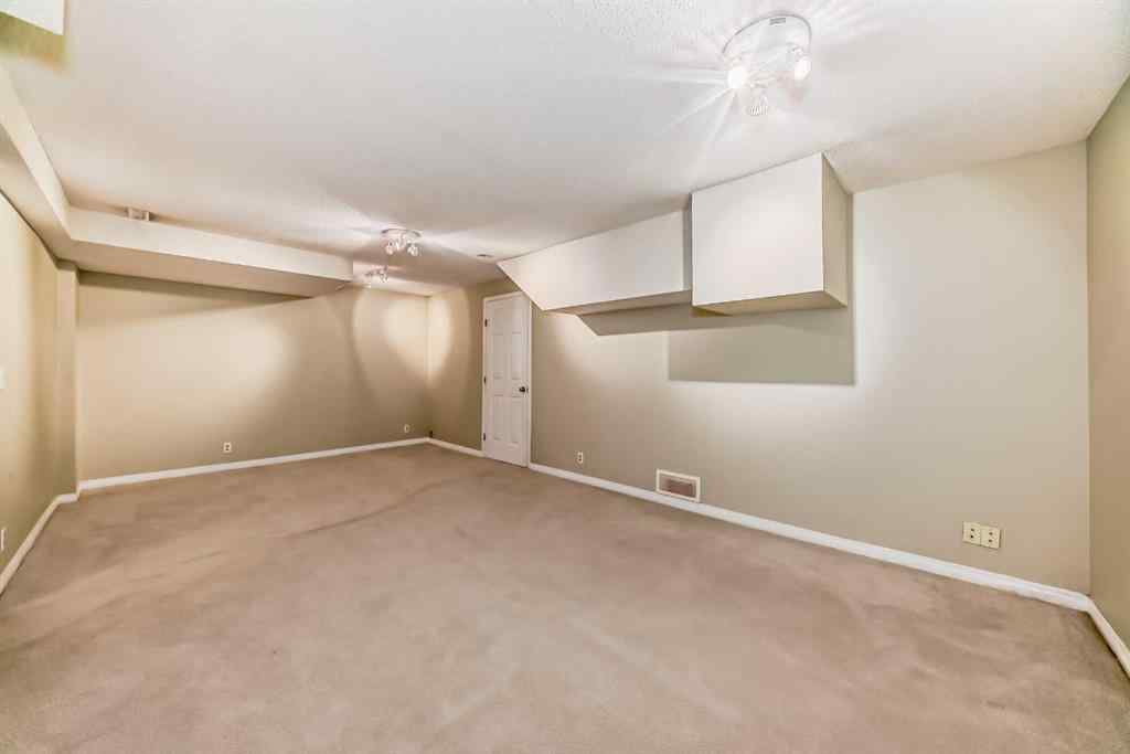 MLS® A2243212 - Unit #23 275 Woodridge Drive SW in Woodlands Calgary, Residential