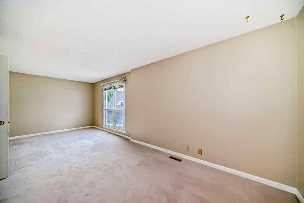 MLS® A2243212 - Unit #23 275 Woodridge Drive SW in Woodlands Calgary, Residential