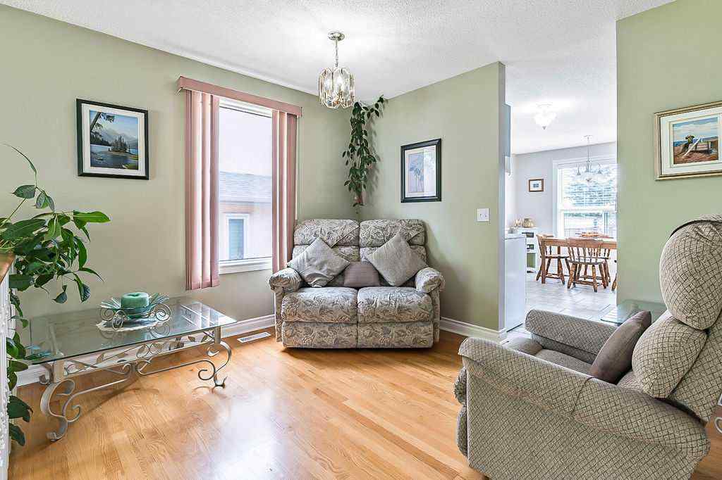 MLS® A2243231 - 141 Shawfield Way SW in Shawnessy Calgary, Residential