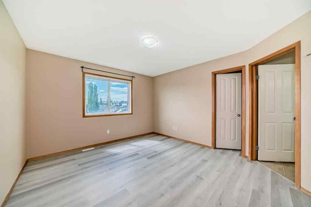MLS® A2243279 - 1183 Everridge Drive SW in Evergreen Calgary, Residential