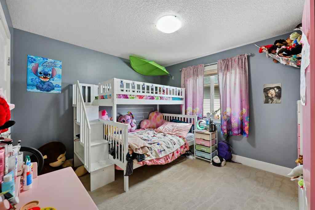 MLS® A2243313 - 913 Canoe Green SW in Canals Airdrie, Residential