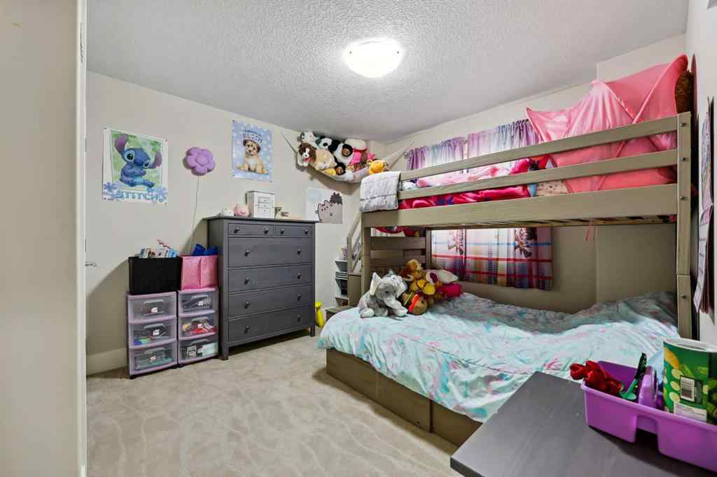 MLS® A2243313 - 913 Canoe Green SW in Canals Airdrie, Residential