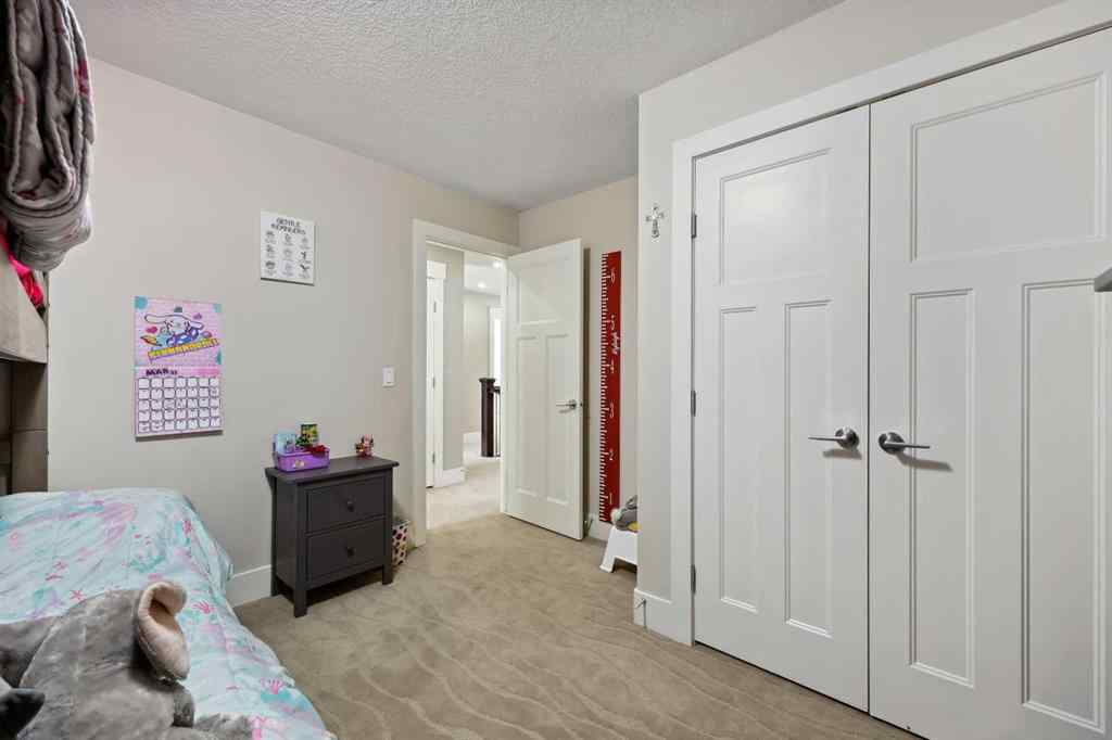MLS® A2243313 - 913 Canoe Green SW in Canals Airdrie, Residential