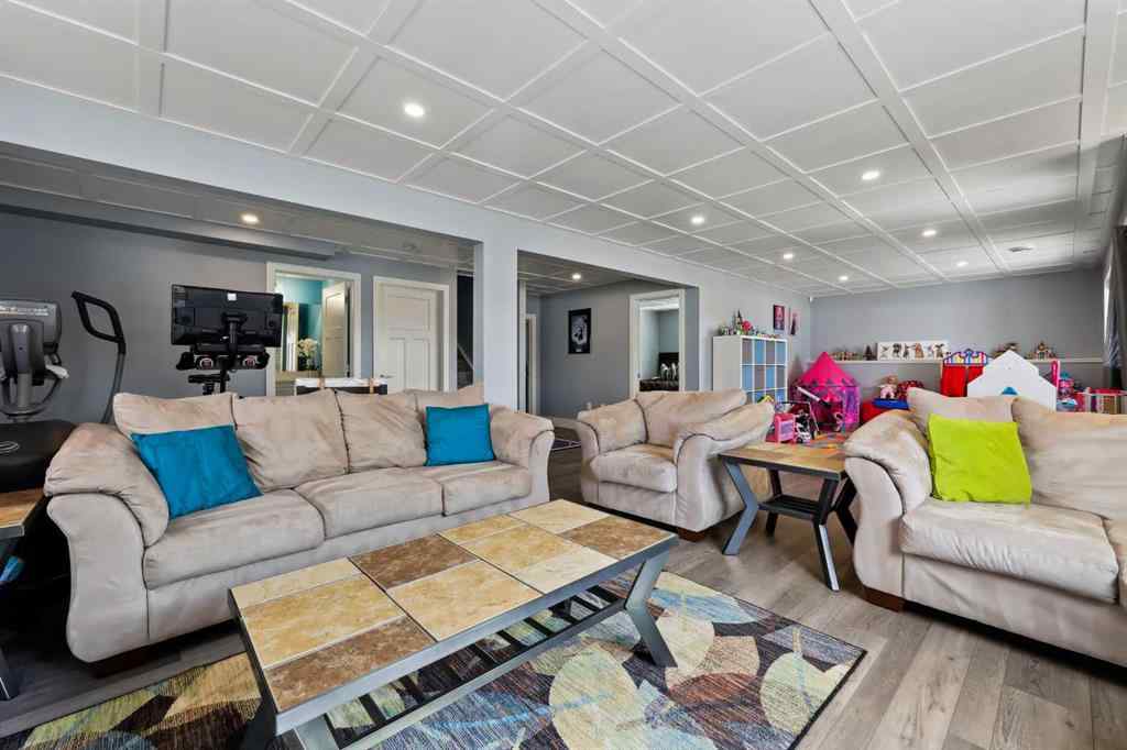 MLS® A2243313 - 913 Canoe Green SW in Canals Airdrie, Residential