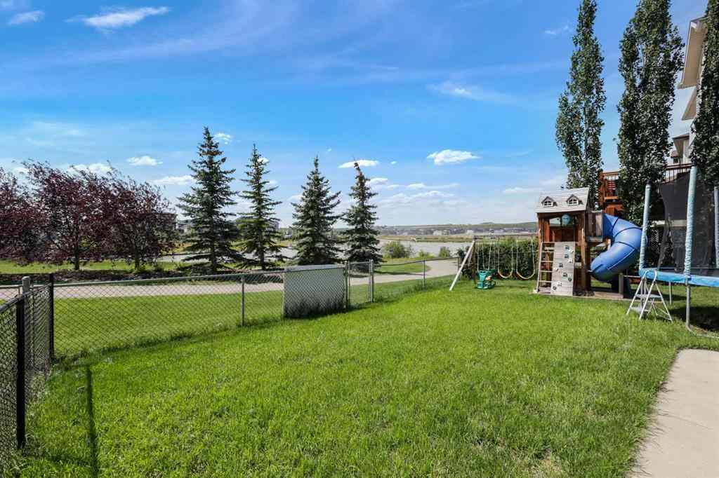 MLS® A2243313 - 913 Canoe Green SW in Canals Airdrie, Residential