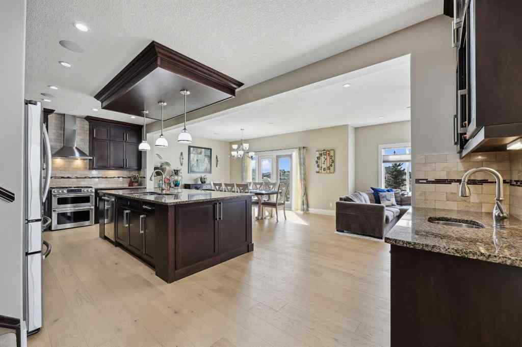 MLS® A2243313 - 913 Canoe Green SW in Canals Airdrie, Residential