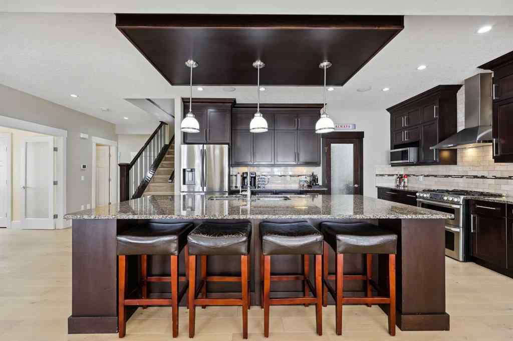 MLS® A2243313 - 913 Canoe Green SW in Canals Airdrie, Residential