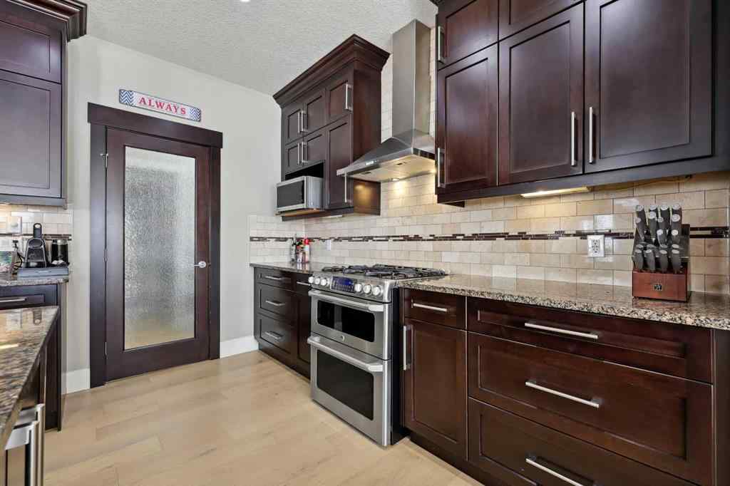 MLS® A2243313 - 913 Canoe Green SW in Canals Airdrie, Residential