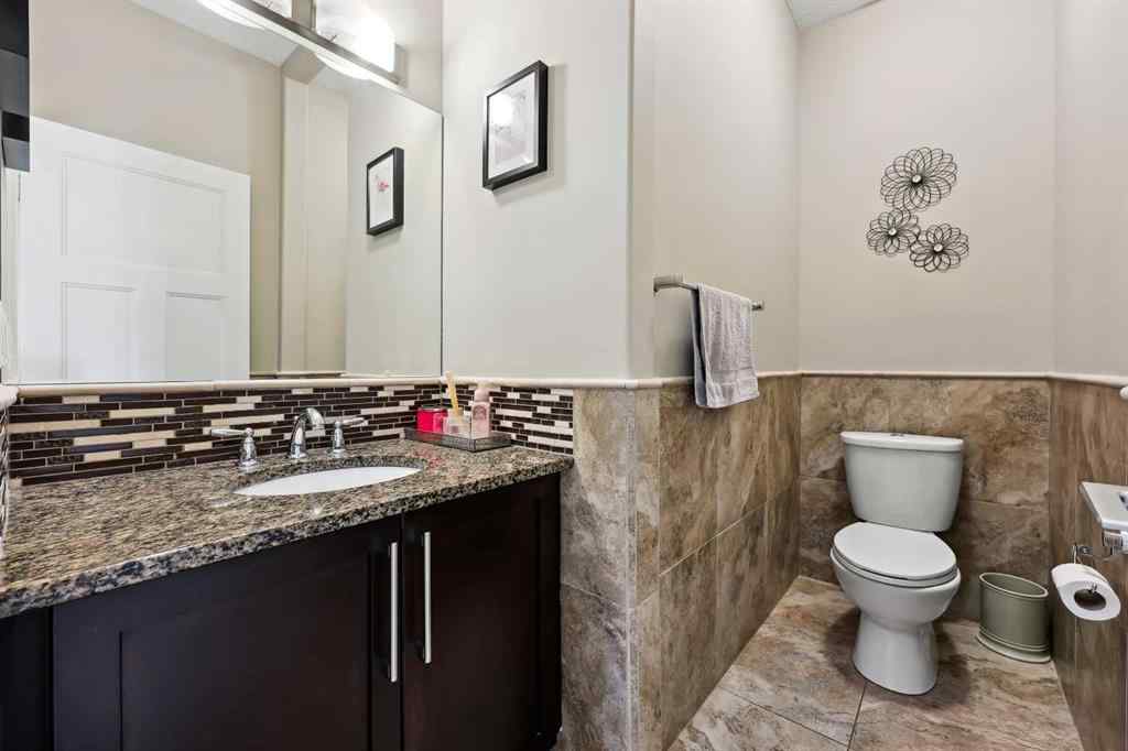 MLS® A2243313 - 913 Canoe Green SW in Canals Airdrie, Residential