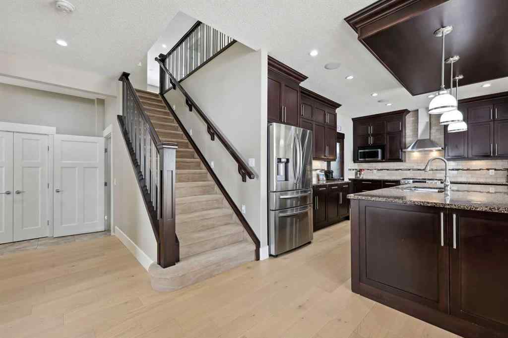MLS® A2243313 - 913 Canoe Green SW in Canals Airdrie, Residential