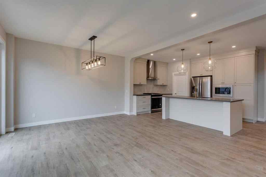 MLS® A2243332 - 1478 Bayview Point SW in Bayview Airdrie, Residential