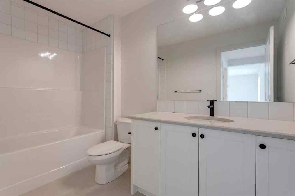 MLS® A2243336 - 21 Bayview Mews SW in Bayview Airdrie, Residential