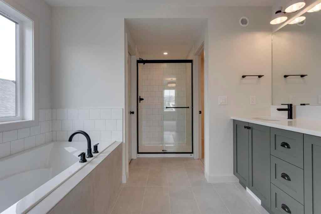 MLS® A2243336 - 21 Bayview Mews SW in Bayview Airdrie, Residential