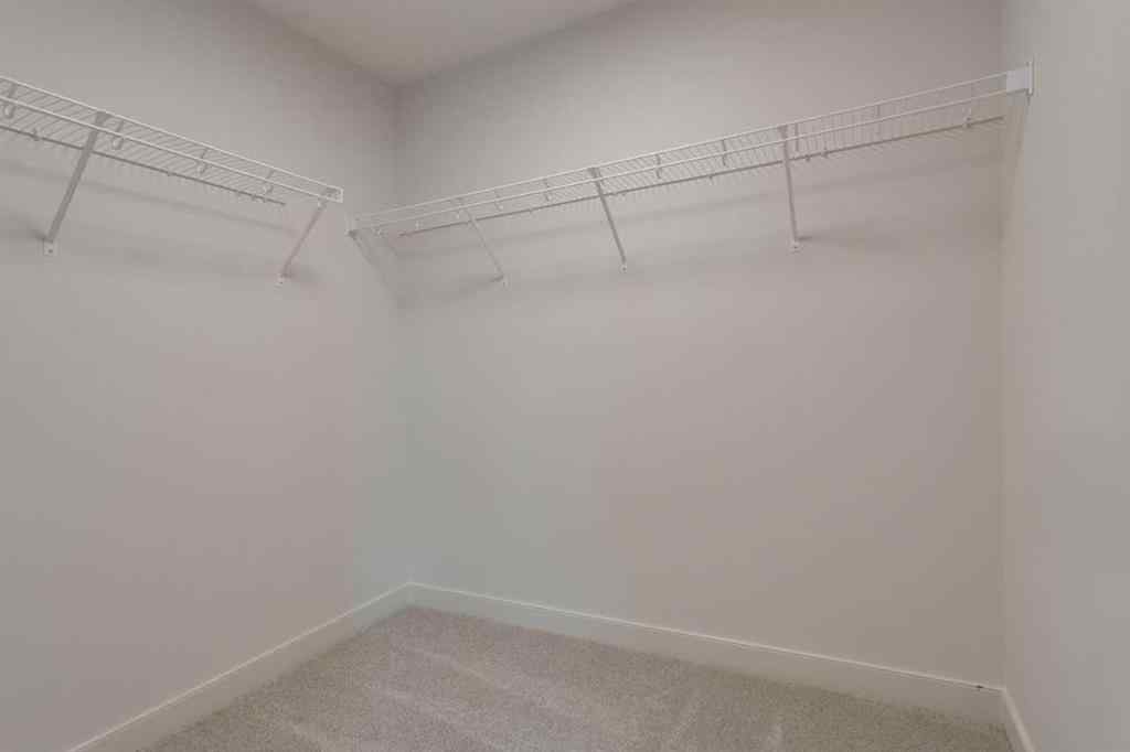 MLS® A2243336 - 21 Bayview Mews SW in Bayview Airdrie, Residential