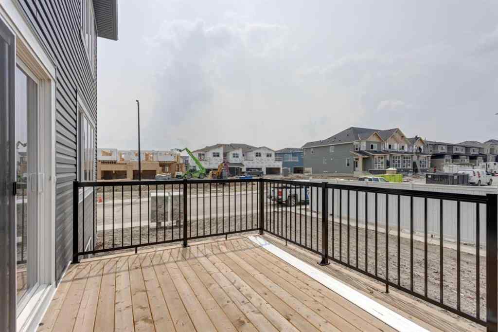 MLS® A2243336 - 21 Bayview Mews SW in Bayview Airdrie, Residential
