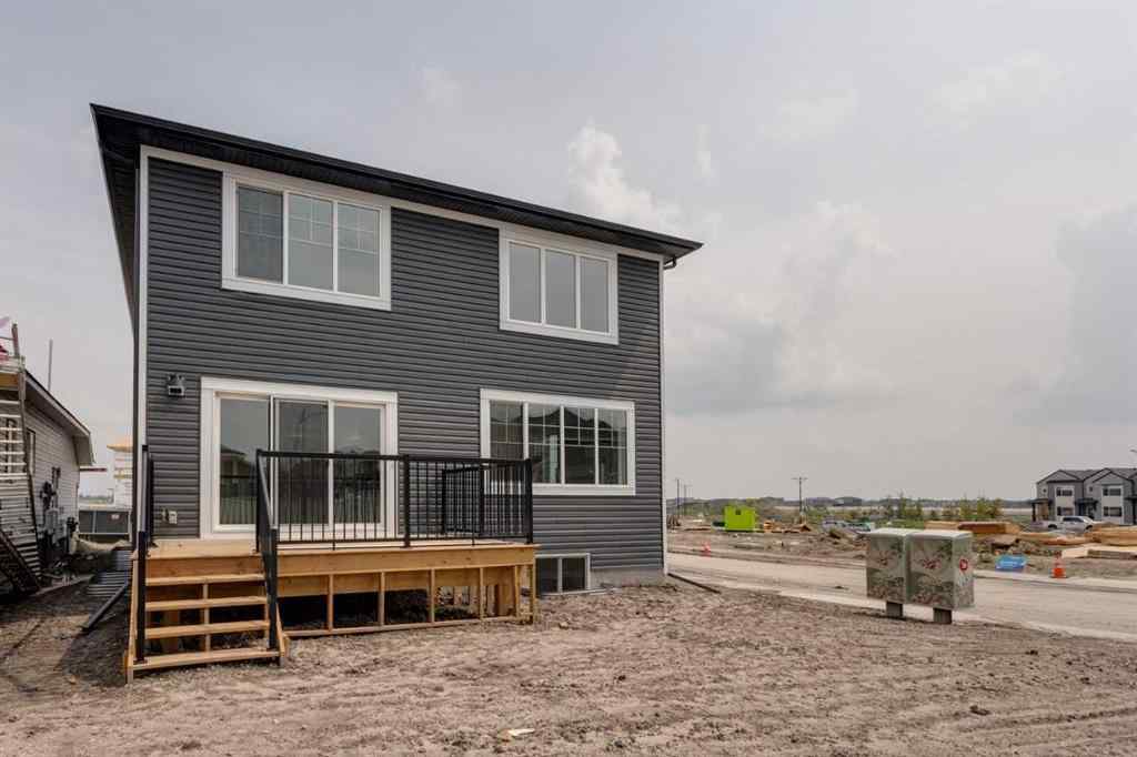 MLS® A2243336 - 21 Bayview Mews SW in Bayview Airdrie, Residential