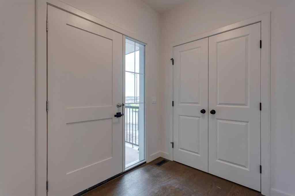 MLS® A2243336 - 21 Bayview Mews SW in Bayview Airdrie, Residential