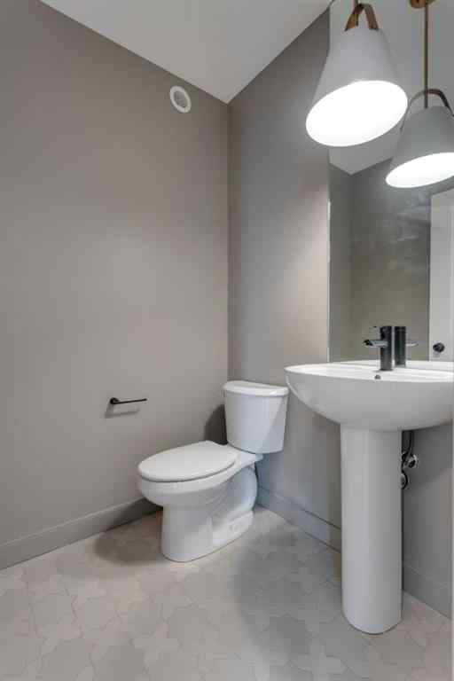 MLS® A2243336 - 21 Bayview Mews SW in Bayview Airdrie, Residential