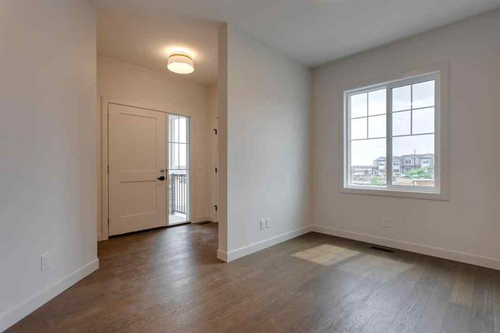 MLS® A2243336 - 21 Bayview Mews SW in Bayview Airdrie, Residential