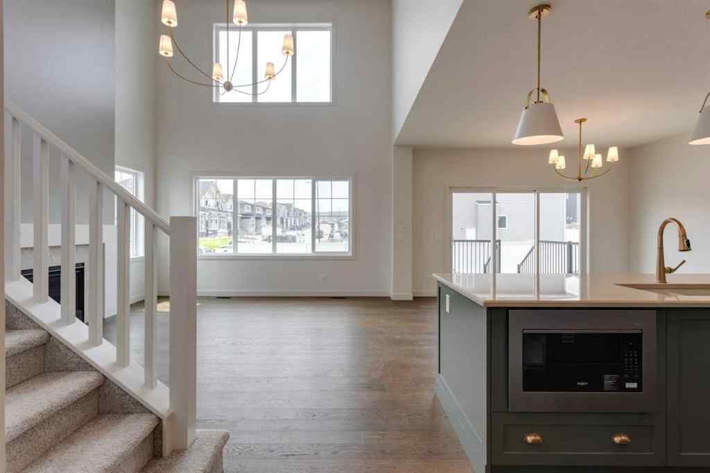 MLS® A2243336 - 21 Bayview Mews SW in Bayview Airdrie, Residential
