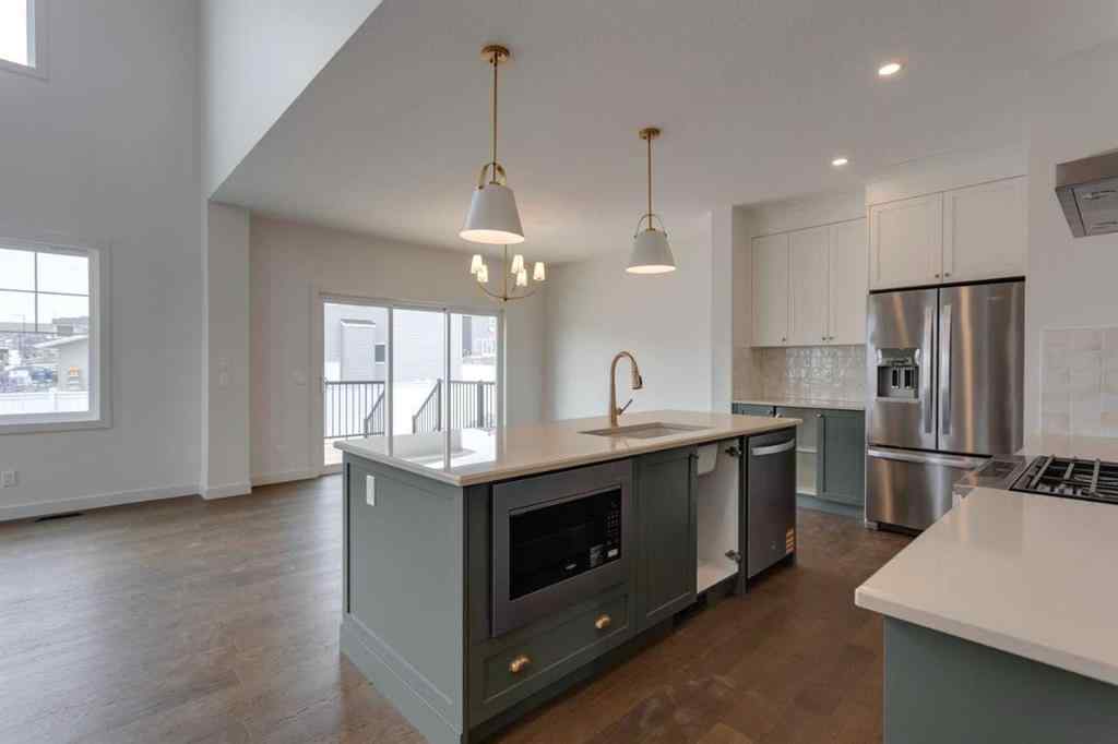 MLS® A2243336 - 21 Bayview Mews SW in Bayview Airdrie, Residential