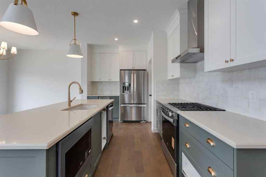 MLS® A2243336 - 21 Bayview Mews SW in Bayview Airdrie, Residential