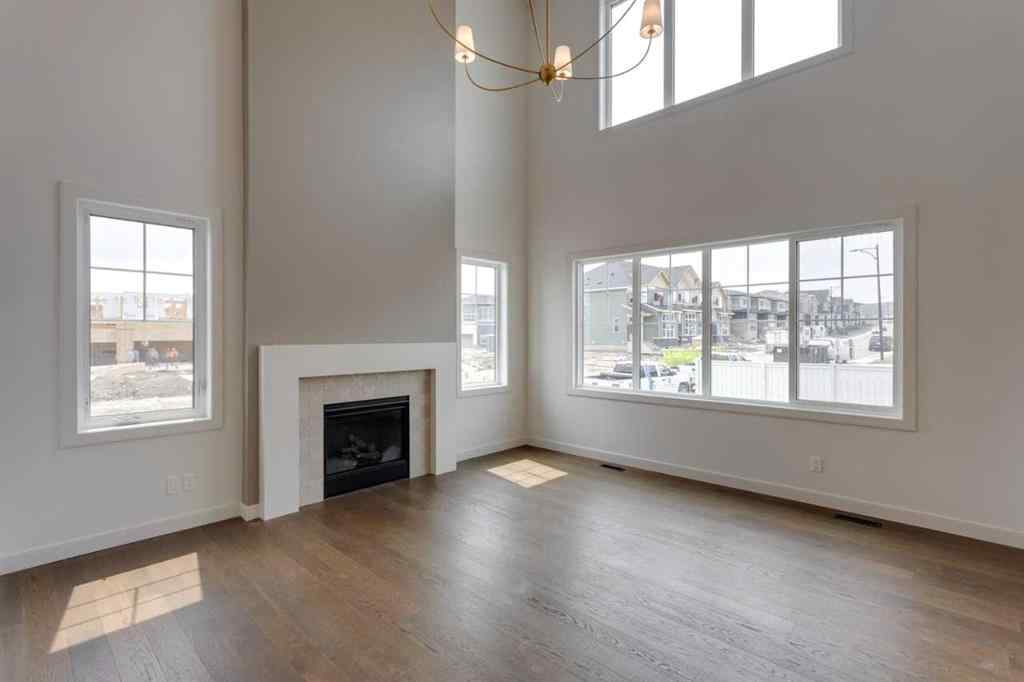 MLS® A2243336 - 21 Bayview Mews SW in Bayview Airdrie, Residential