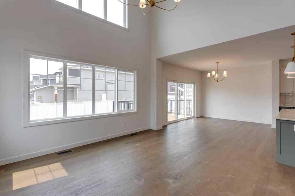MLS® A2243336 - 21 Bayview Mews SW in Bayview Airdrie, Residential