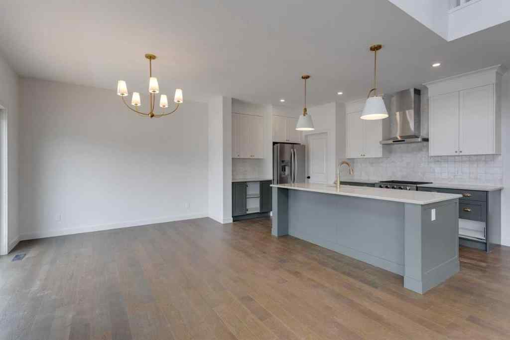 MLS® A2243336 - 21 Bayview Mews SW in Bayview Airdrie, Residential