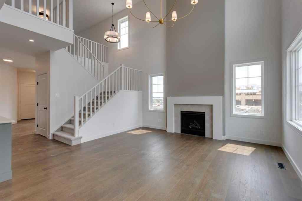 MLS® A2243336 - 21 Bayview Mews SW in Bayview Airdrie, Residential