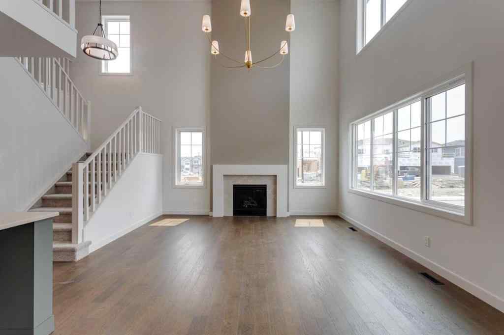 MLS® A2243336 - 21 Bayview Mews SW in Bayview Airdrie, Residential