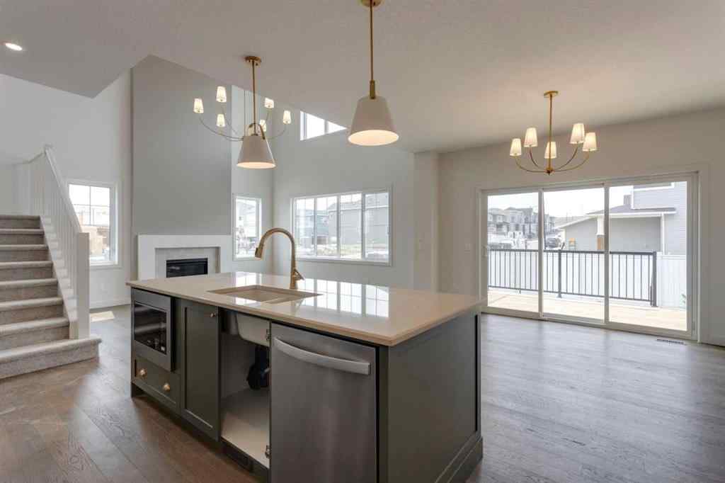MLS® A2243336 - 21 Bayview Mews SW in Bayview Airdrie, Residential