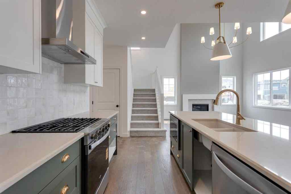 MLS® A2243336 - 21 Bayview Mews SW in Bayview Airdrie, Residential