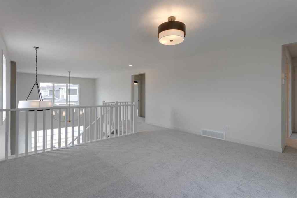 MLS® A2243336 - 21 Bayview Mews SW in Bayview Airdrie, Residential